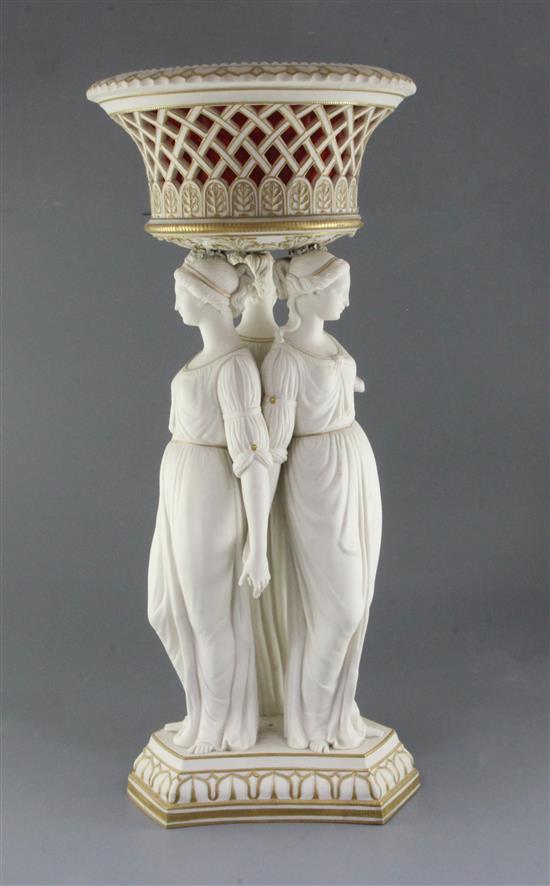 An impressive Copeland parian centrepiece, The Three Graces, 65.5cm, repair to basket